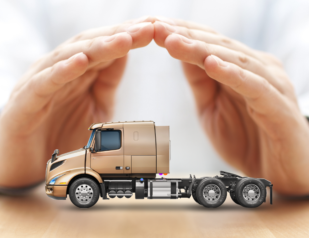 A commercial truck on a highway under clear skies in Dublin, Ohio, showcasing reliable trucking insurance solutions by Insurance Company Dublin Ohio LLC.