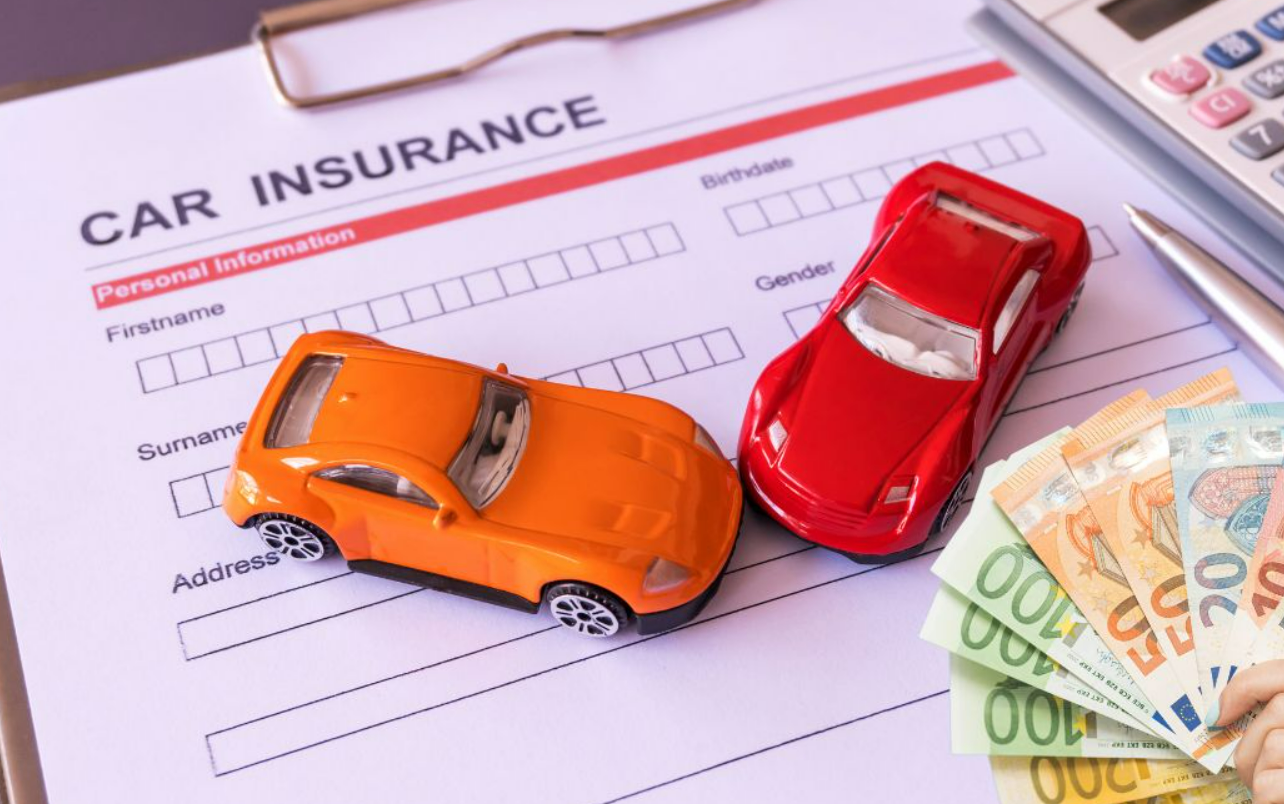 Auto Insurance coverage policy document with a car model representing protection and security by Insurance Company Dublin Ohio.